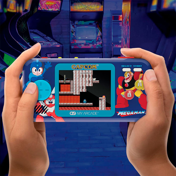 DREAMGEAR CONSOLA PORTÁTIL MEGA MAN POCKET PLAYER PRO CON PANTALLA DE 7 CM, ESTUCHE DE VIAJE Y 6 JUEGOS INCLUIDOS