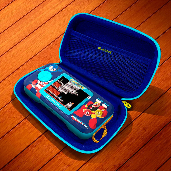 DREAMGEAR CONSOLA PORTÁTIL MEGA MAN POCKET PLAYER PRO CON PANTALLA DE 7 CM, ESTUCHE DE VIAJE Y 6 JUEGOS INCLUIDOS